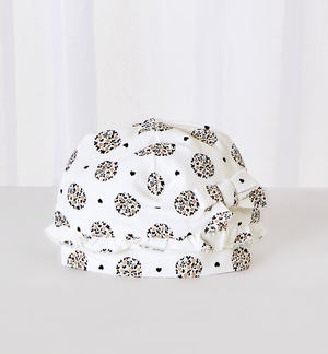 Cappellino modello cuffia con fiocco neonata PANNA